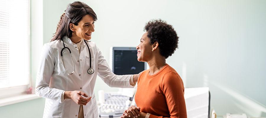 Doctor talking to a female patient