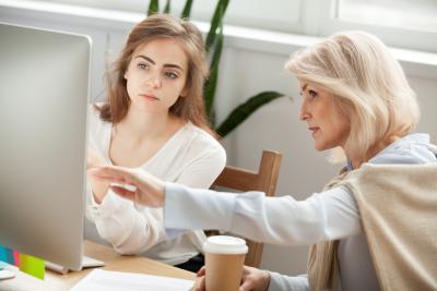 Manager and Worker on computer