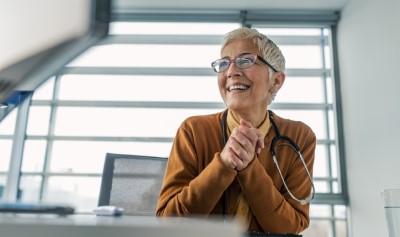 Retired Nurse Executive Smiling